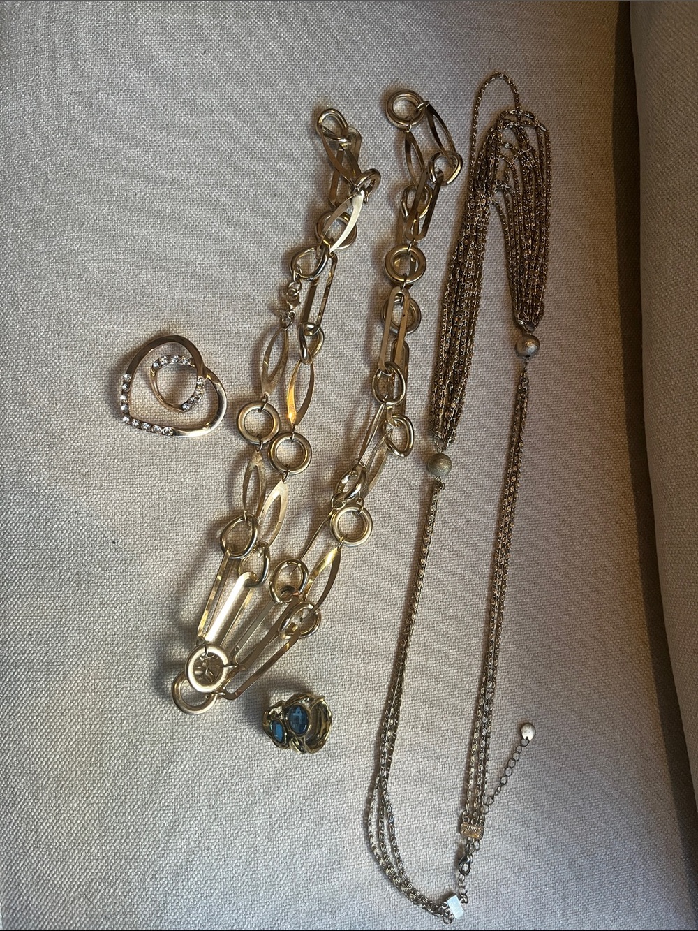 2 Gold-Tone Multi-Chain Necklaces, 1 scarf jewelry and a gorgeous Ring.